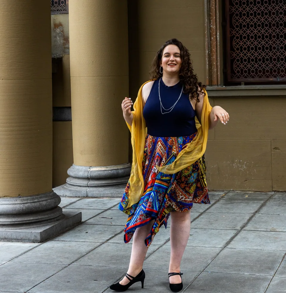 Leora Gilgur, mezzo-soprano, in a teal sweater