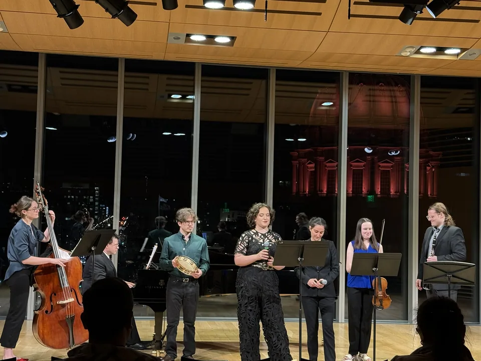 The Jewish Music Collective musicians performing together on stage